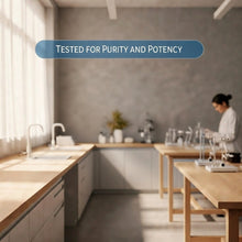 Person in a white coat at a laboratory bench beneath the words “Tested for Purity and Potency.”